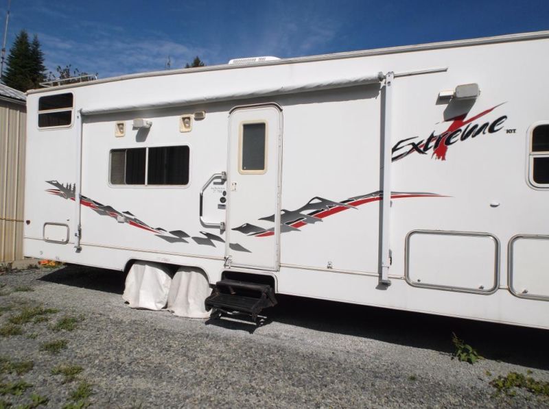 32 FOOT 2002 EXSTREME TOY HAULER BY KIT,TOY STORAGE AREA IS 15 FOOT