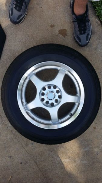 Brand new single Falken tire & 5 spoke aluminium wheel. Fits many cars, 2