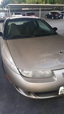 Saturn : S-Series 3 door coupe 1999 manual saturn 3 door coupe tan fair body condition great on gas