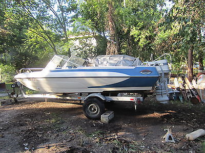 1973 Glastron trihull ski/fishing boat with 115hp Evinrude outboard & trailer