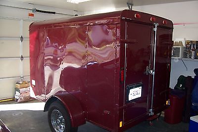 5X8 Enclosed Trailer. Good Condition, New Tires, Color is Sports Red.