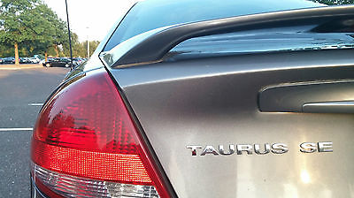 Ford : Taurus SE Sedan 4-Door 2005 ford taurus metallic dark shadow gray rear spoiler chrome wheels new tires