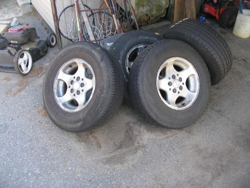 4 tires w rims for 1998 but not 2001 or newer 5 lugs 60% good tires