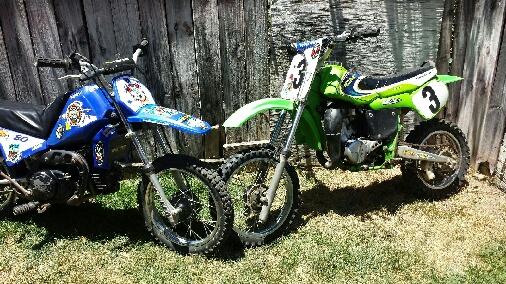 2 Racing Dirt Bikes (Not sold Separately )