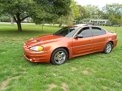 Pontiac : Grand Am 4dr Sdn SE1 Grand Am GT Sunburst Orange