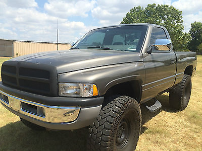 Dodge : Ram 1500 single cab 4 x 4 4 in suspension lift 3 in body lift sittin on 48.5 x 14.5 in mud tires