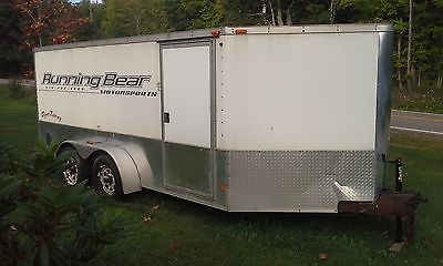 Enclosed motorcycle trailer