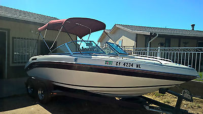 19' CELEBRITY OPEN BOW BOAT WITH TANDEM AXEL TRAILER MERCRUISER 5 V8