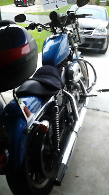 Harley-Davidson : Sportster bike has a trunk/wind shield/blue in color