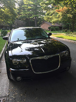 Chrysler : 300 Series S Package limited edition  Black Chrysler 300-S with custom rims ( price negotiable )
