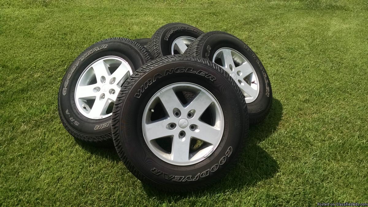 Jeep tires. Wheels included
