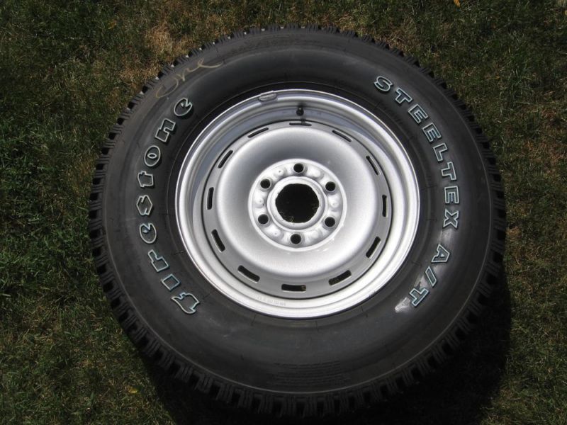 New 245/75R16 Firestone Steeltex A/T Tire on GM Chevrolet GMC Wheel, 0