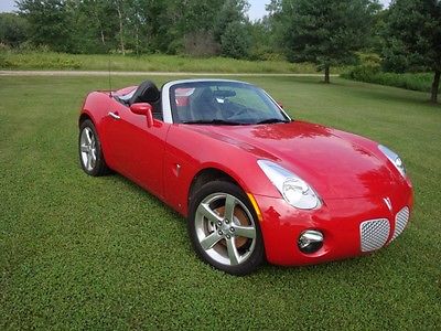 Pontiac : Solstice Base Convertible 2-Door CONV, RED, BLK LEATHER INT, AIR, CRUISE, PWR WIN, XM SAT. RADIO MP3