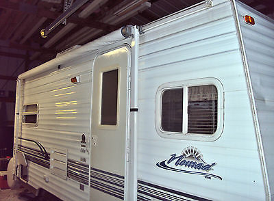 04  19ft. Nomad travel trailer. New microwave,awning an tires.