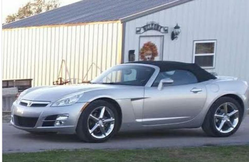 08 Saturn Sky convertible roadster. Head turner.