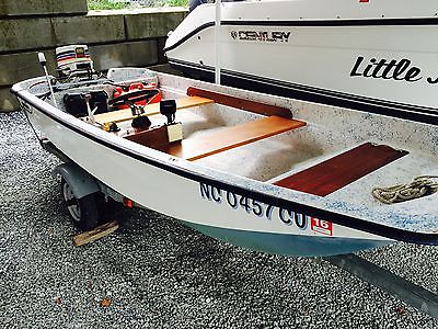 1961 BOSTON WHALER 13 FT. VERY GOOD CONDITION, 28HP EVINRUDE, TRAILER INCLUDED