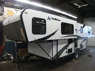 Brand New TrailManor 2720QB camper thats only 2700 lbs, fits in garage, sleeps 6