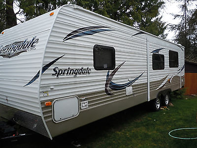 32' tow behind camping trailer. All new. Used once. Kitchen, bathroom, Pull out