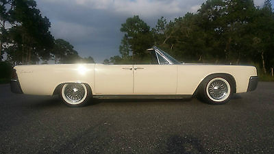 Lincoln : Continental Convertible four door (suicide door style) 1961 continental convertible white top white exterior red white interior
