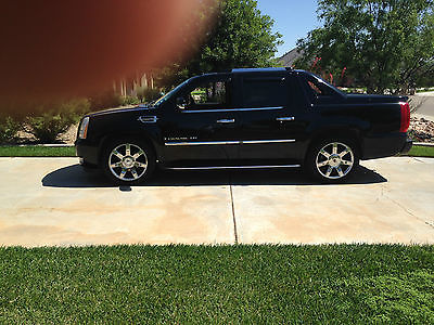 Cadillac : Escalade full leather on alll four seats Cadallic Escalade EXT (the one that looks like a fancy pickup)