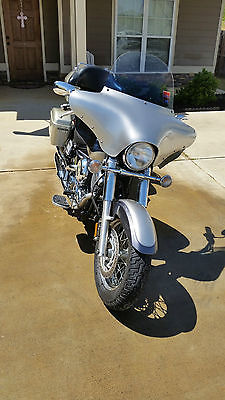 Yamaha : V Star Custom bags, trunk, faring, seats.  Never been dropped.