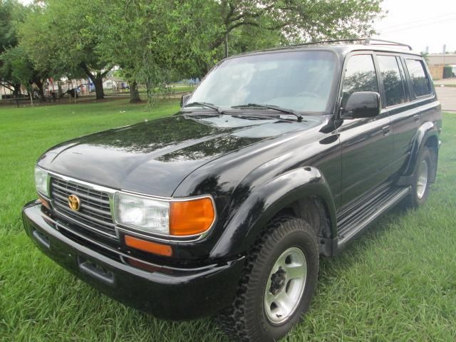 1996 black Toyota Land Cruiser, Auto Lock Outs, Leather