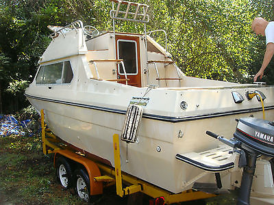 25' Cabin Cruiser 8' beam 6 cyl turbo charged Volvo diesel on 2 axle trailer