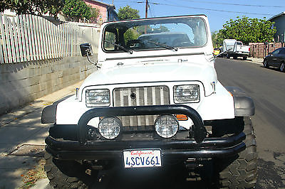 Jeep : Wrangler American Wrangler WHITE JEEP WRANGER 1987 6 CYLINDER WHITE, WITH LIFT KIT, 33 IN TIRES, WITH ACCES