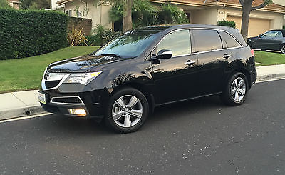 Acura : MDX Entertainment Package (DVD) Elegant Black MDX with Grey Burlwood interior trim and entertainment package
