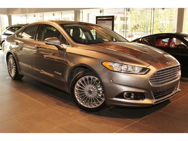 Ford : Fusion Titanium Titanium  Hybrid-electric 2.0L CD LEATHER NAVI MOON ROOF ONE OWNER HEATED SEATS