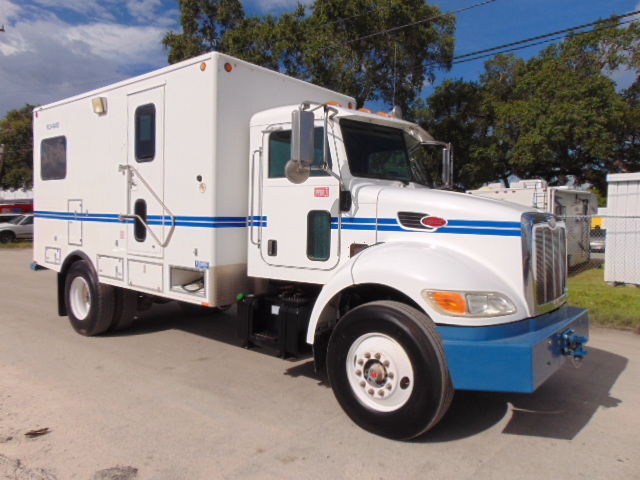 Other Makes WHOLESALE 2006 peterbilt 335 cummins diesel daycab tractor mobile office command center