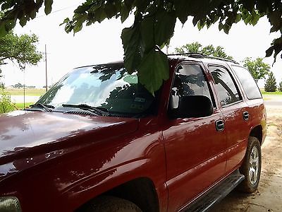 Chevrolet : Tahoe 4 doors 2001 tahoe chevy red v 8 good conditions 4 doors air conditioner cd player cruse