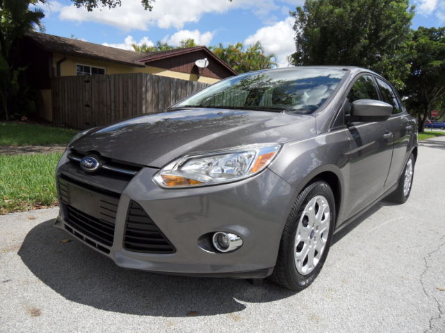 Ford : Focus 4dr Sdn SE WOW! CARFAX - THEFT RECOVERY - PRISTINE - VIDEO - JUST STOP LOOKING. - 13 14 SEL