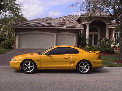 Ford : Mustang  GT   Mustang Gt 2dr coupe, yellow with black leather interior.