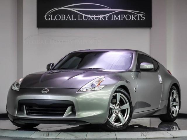 Nissan : 370Z Touring Touring Coupe Exhaust: dual exhaust tips Mirror color: body-color Cargo cover