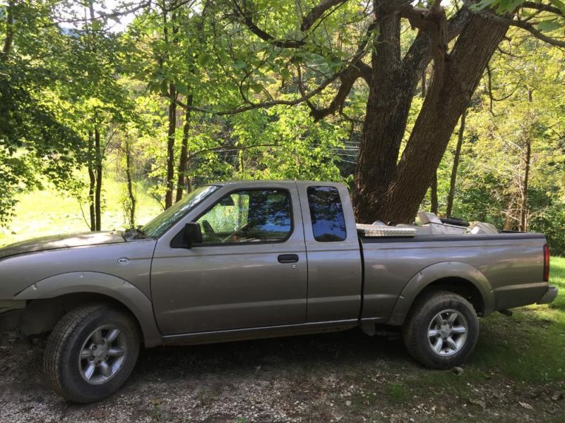 2003 nissan frontier wrecked clean title