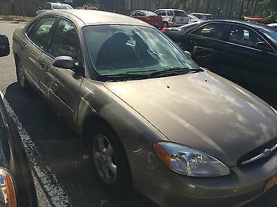 Ford : Taurus SE 2003 ford taurus se gold in excellent condition runs well