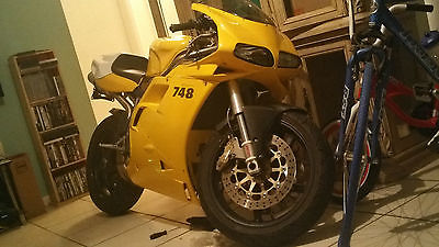 Ducati : Supersport 2001 ducati 748 s yellow with white raced stripe