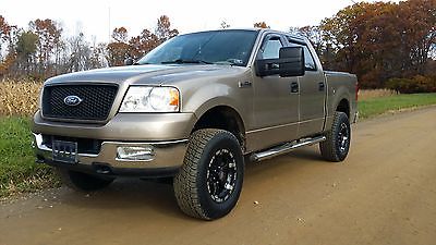 Ford : F-150 xlt 2004 ford f 150 xlt crew cab 4 x 4 pickup 4 door 5.4 l v 8 with 2 leveling kit