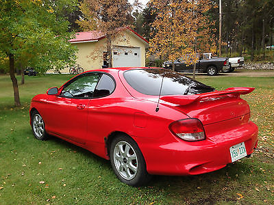 Hyundai : Tiburon A small sporty car.