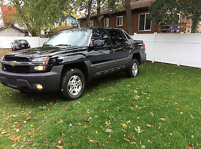 Chevrolet : Avalanche NOTRH FACE 2003 chevy avalanche z 71 flawless rust free florida truck black on black
