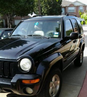 Jeep : Liberty 2002 black jeep liberty limited 3.1 l with tan leather interior a real beauty