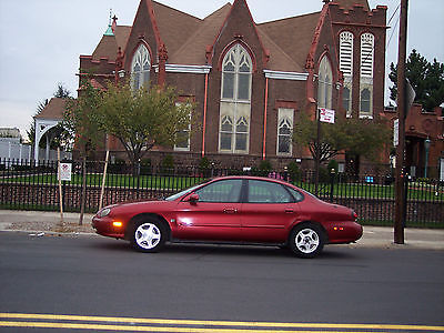 Ford : Taurus SE Sedan 4-Door 1999 ford taurus se red exterior beige interior