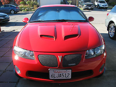 Pontiac : GTO Base 2006 m 6 gto torrid red blk 35 k 2 nd owner like new clear title 20 k obo