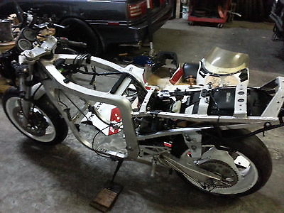 Suzuki : GSX-R Factory   Road Race Replica ,Red -Black-White with 13000rpm engine. single seat.