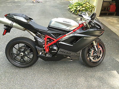 Ducati : Superbike Ducati 848 Evo Corsa only150 miles! Ducati jacket and two helmets. Perfect