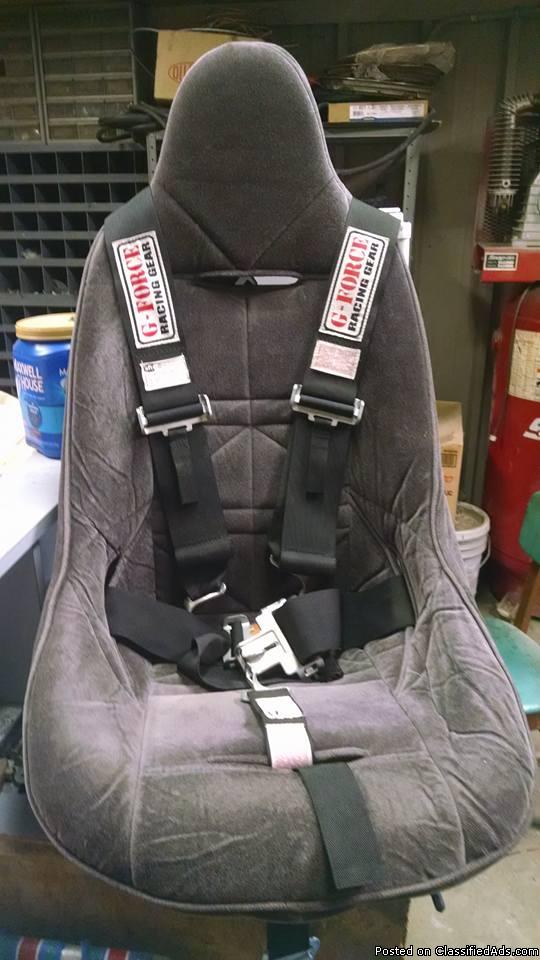 A set of Racing seats with a harness