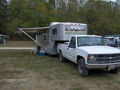 1991 Trailer 3 horse trailer, awning, AC, cabinets and heater.