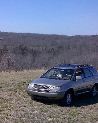 Lexus : RX 300 Great SUV, perfect interior, cold air, 6 disc cd, new tranny, needs motor
