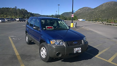 Ford : Escape XLS Sport Utility 4-Door basic I bought new, have records, no leaks,drips.  Surface scratches, runs great.super
